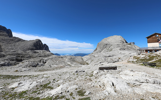Panorama of the Italian Alps with the alpine refuge called RIFUGIO ROSETTA or PEDROTTI in Italy