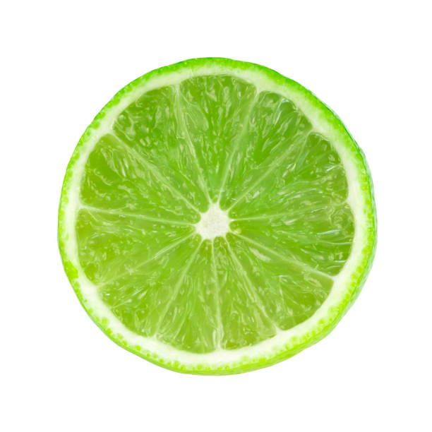 istock Sliced juicy green lime. Closeup. Isolated on a white background 1435485040