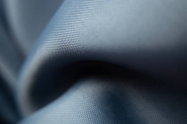 istock gray wrinkled silk fabric for background macro photo, fabric 1435487163