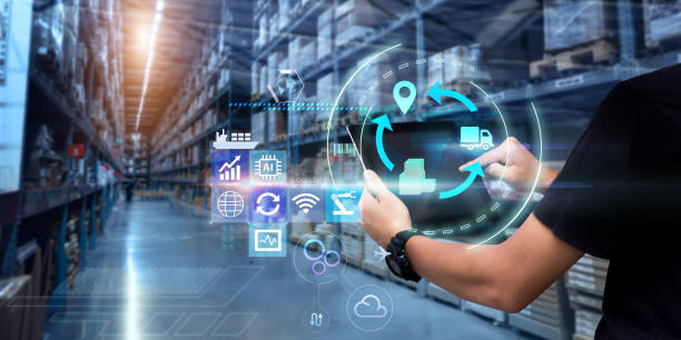 Business Logistics technology concept. Man hands using tablet on blurred warehouse as background smart stock pictures, royalty-free photos & images