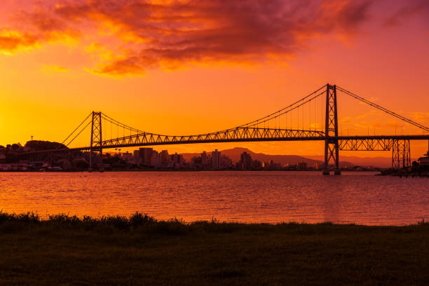 The Hercilio Luz Bridge, in Florianopolis, Brazil, with an amazing sunset.