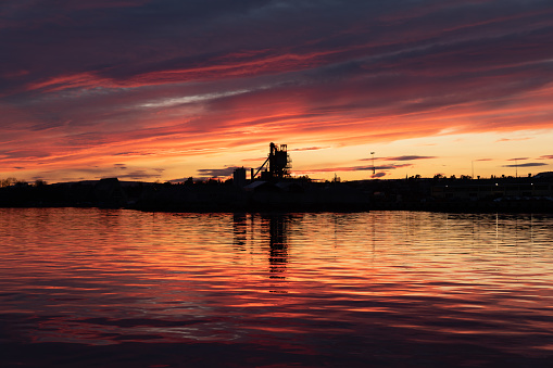 industrial structure and a summer sunset in the Fjord in the city of Oslo in Norway