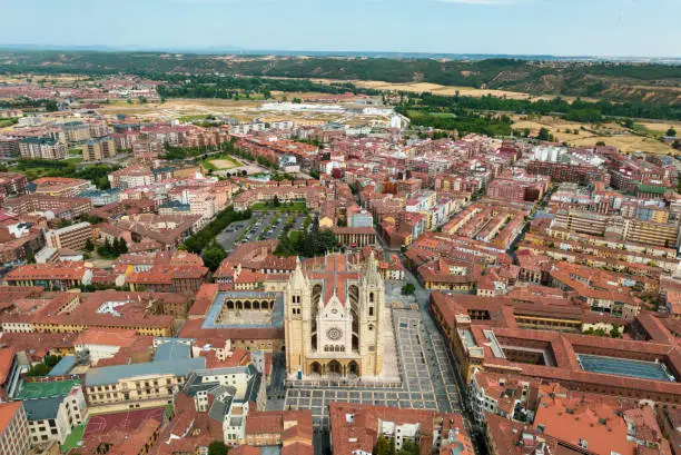 León City in Summer with old gothic Santa María de Regla de León Cathedral from 13th Century in the downtown city center. Aerial Drone Point of View. Leon Cathedral, León, Castile y León, Spain, Europe