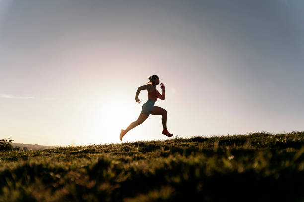 istock Woman Running in the Park 1435500070