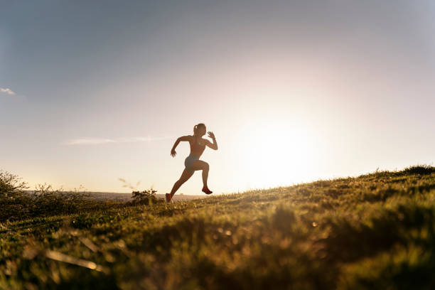 istock Woman Running in the Park 1435500083