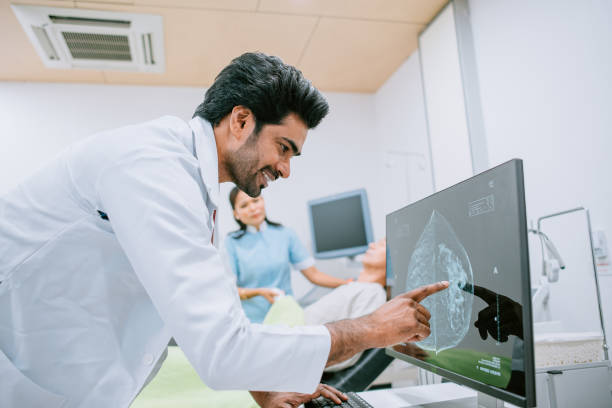 Doctor is working with CT scan in hospital stock photo