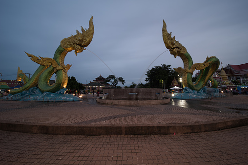 The Naga Statue in the evening in Nong Khai, Thailand.