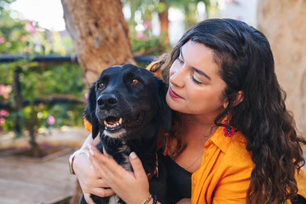 istock Young woman with her dog. 1435501339