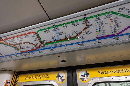 Hong Kong - October 20, 2022 : MTR system map inside the train in Hong Kong. MTR is a major public transport network serving Hong Kong.