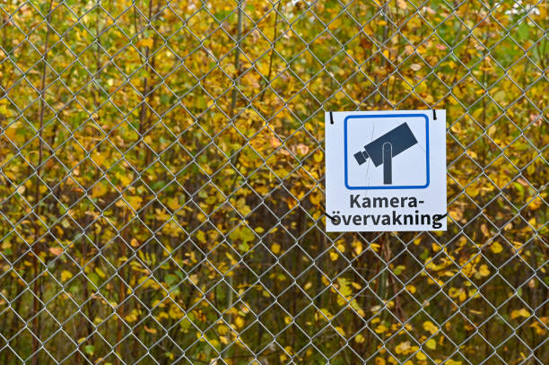 sign in Swedish with the text Camera surveillance on a fence in Sweden october 10 2022