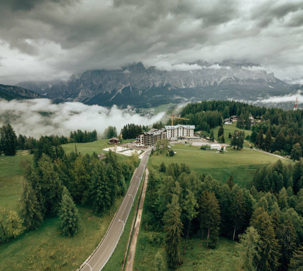 village in the dolomites under the clouds