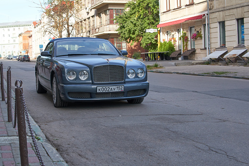 Nizhny Novgorod, Russia - September 04, 2022: A grey Bentley Azure car parked on street.