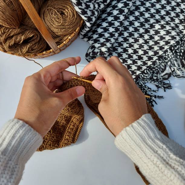 istock woman hands is crocheting 1435513920