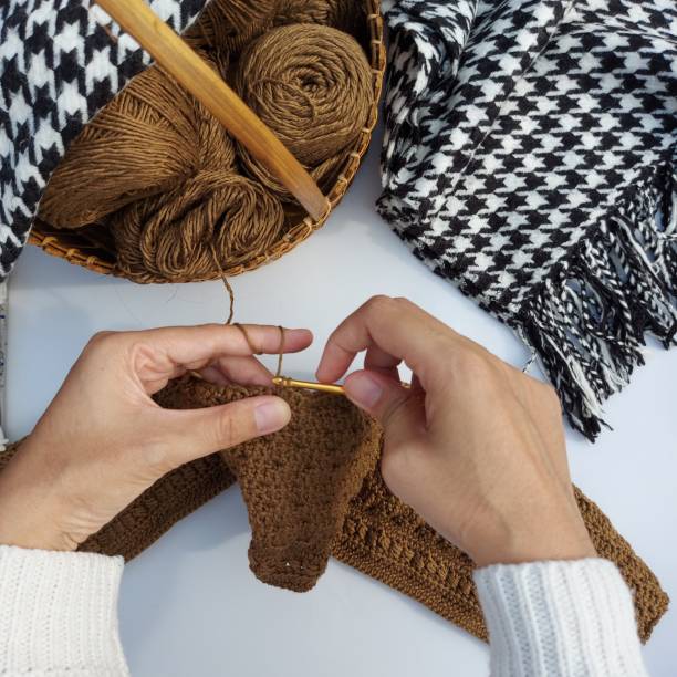 istock woman hands is crocheting 1435513993