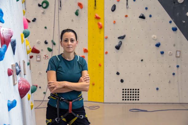 istock Professional female rock climber at indoor training gym 1435518355