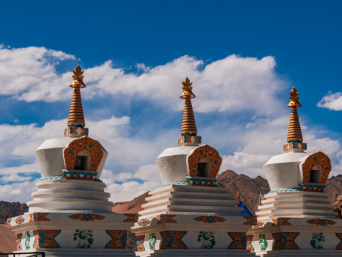 Buddhist Stupa with beautiful mountain range of Ladakh, highest plateau in India.