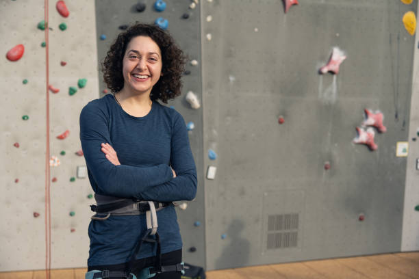 istock Female professional rock climber at training center 1435519167