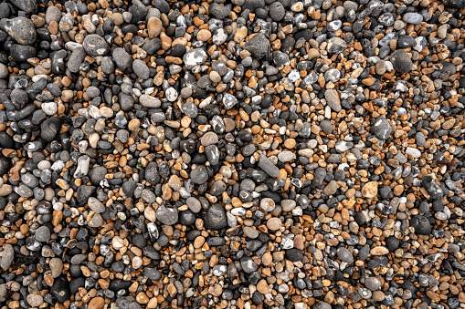 Macro detail of the Kent beach sand gravel texture in England UK