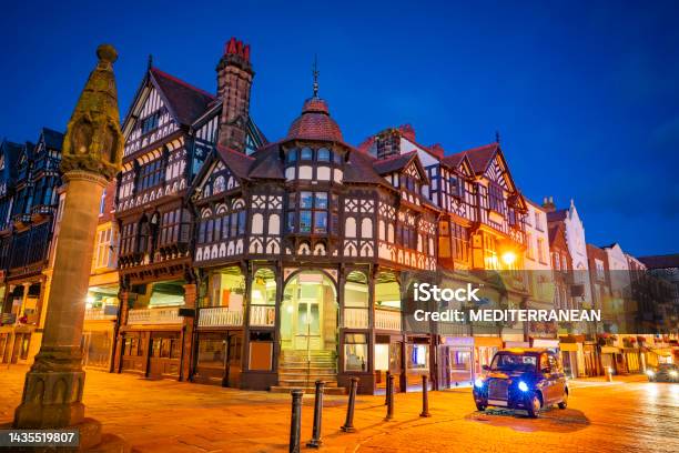 Chester Chester Cross In Bridge Street At Sunset In England Uk Stock Photo - Download Image Now