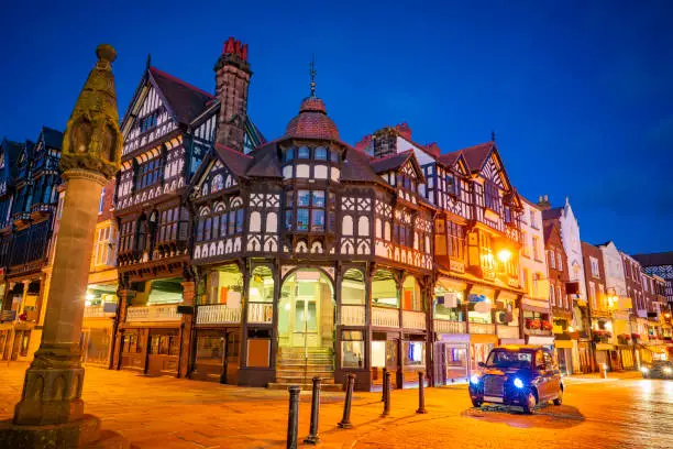 Chester Chester Cross in Bridge Street at sunset in England UK United Kingdom