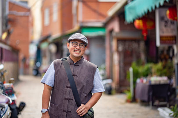 istock Portrait of confident tour guide 1435520565