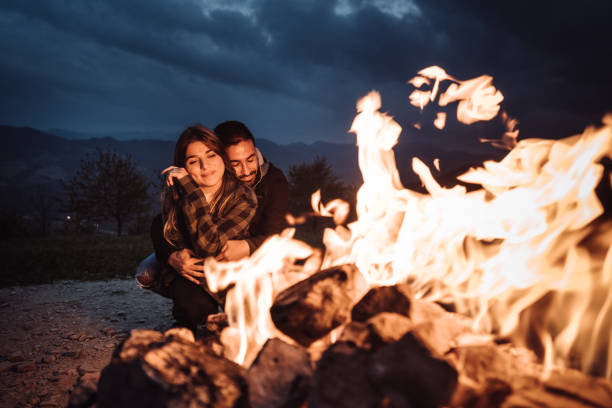 istock lovers spending quality time in front of the fire 1435520635