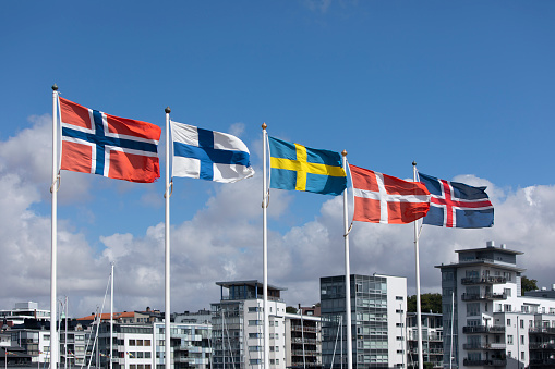 Flags of the Nordic coutries waving in the wind