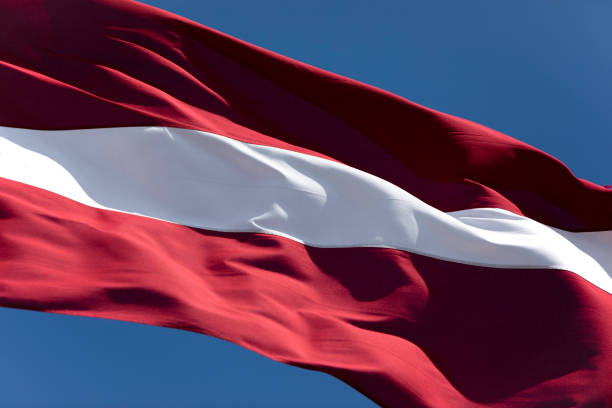 istock Latvian flag diagonal close-up 1435522524