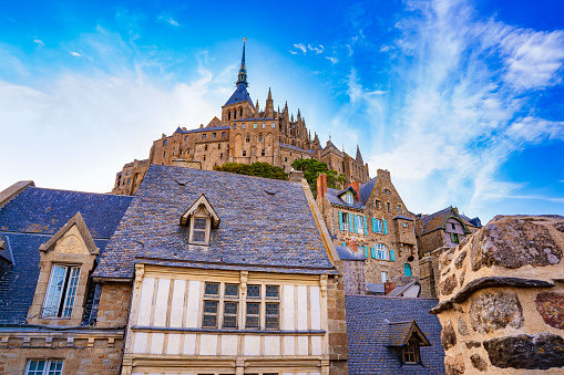 Mont Saint-Michel abbey in Normandy France, from 1979 is Unesco Heritage. All the architecture is considered historical monuments. In the year 709 the Bishop of Avranches, Saint Aubert built the first church. In 1204, Breton warriors set it on fire, the new monastery was completed in 1228 thanks to King Philip II Augustus