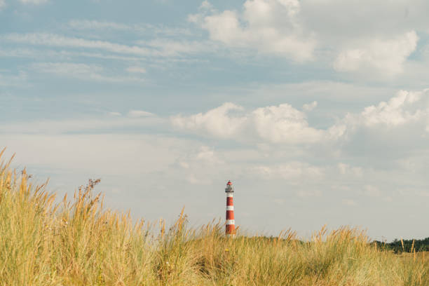 Egmond aan Zee lighthouse in the dunes during sunset. The Egmond Lighthouse, officially known as the J.C.J. van Speijk Lighthouse, is a notable lighthouse located in Egmond aan Zee, a coastal village in the province of North Holland, Netherlands.