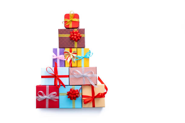 istock Christmas gift boxes arrangement with christmas tree shape isolated on white 1435534947