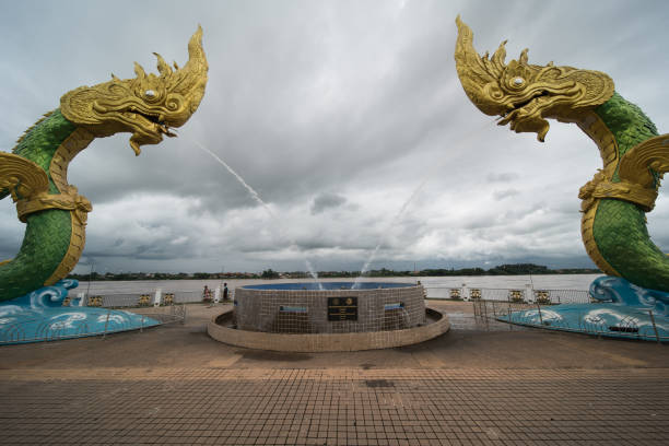 The Naga Statue in Nong Khai, Thailand. The landmark of the town at the mekong promenade. nong khai province stock pictures, royalty-free photos & images