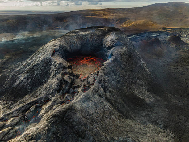 istock Volcano crater from above with lava before the eruption 1435542983