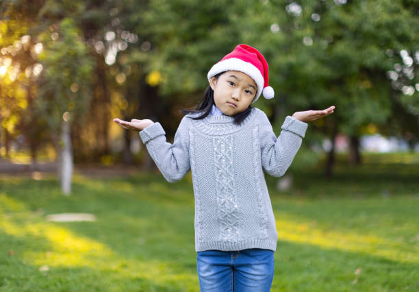 Christmas Girl Shrugging Shoulder