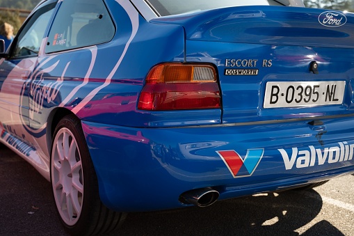 Barcelona, Spain – August 13, 2022: The Ford Escort mk5 Cosworth rally car with Valvoline sponsor.