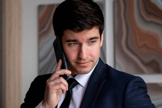 istock businessman in a dark blue suit working in the office 1435561840