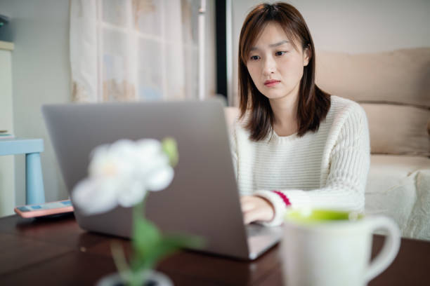 istock Young woman working from home 1435564179