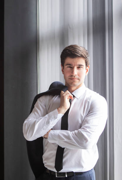 istock businessman in a dark blue suit working in the office 1435564833