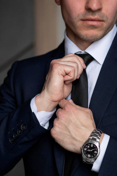 istock businessman in a dark blue suit working in the office 1435565397