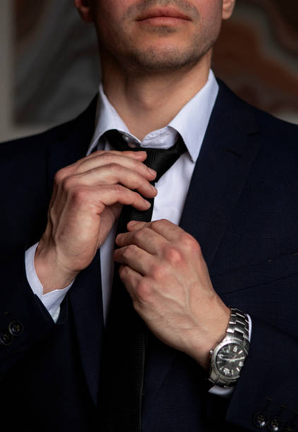 istock businessman in a dark blue suit working in the office 1435566162