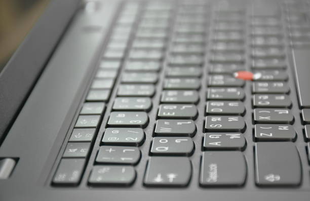 istock keyboard on black compute laptop background and texture 1435571308