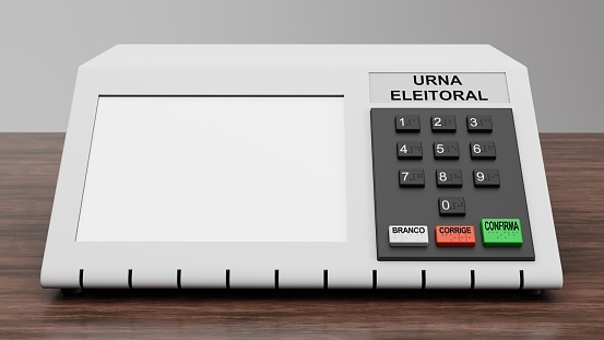 3d rendering of Brazilian electronic ballot box on top of wooden table, with empty white screen for text or image, written in Portuguese: 