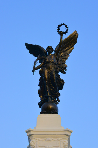 Port of Spain, Trinidad island, Trinidad and Tobago: The Cenotaph - Memorial Park - winged goddess of victory with palm branch and laurel wreath. Sculptor Louis Frederick Roslyn (1920), originally erected “in honour of all who served, in memory of those who fell” during World War I, later WWII names were added.