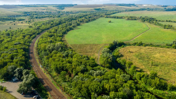 istock A view from the top of the railway passing through forests and agricultural fields 1435589030