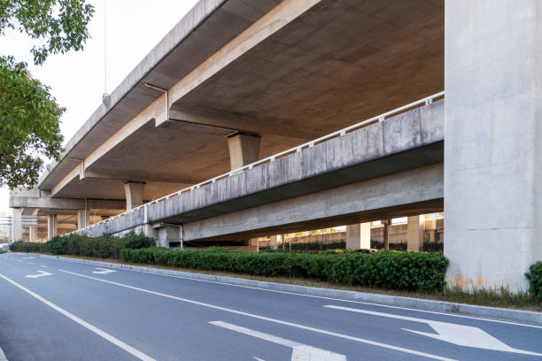 istock Concrete structure and asphalt road space under the overpass in the city 1435590901
