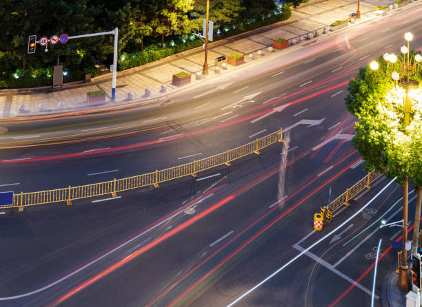 istock moving car with blur light through city at night 1435592169