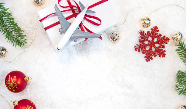 istock Christmas background with airplane. New Year. Selective focus. 1435594985