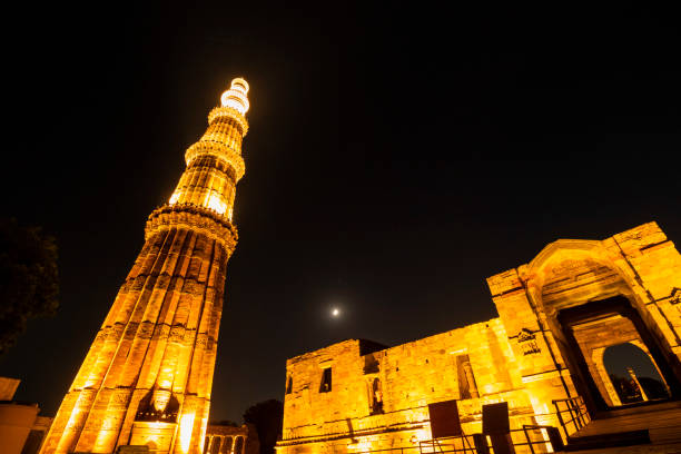 istock Qutub minar at night with lights 1435595850