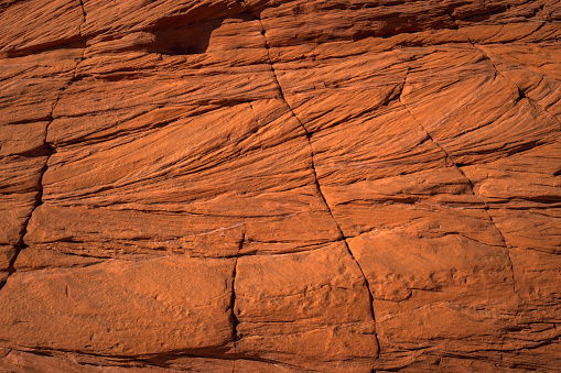 Massive, tall red and white sandstone rock formations and \