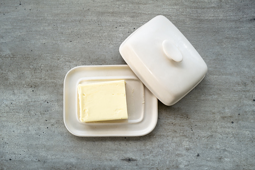 Butter on a concrete background